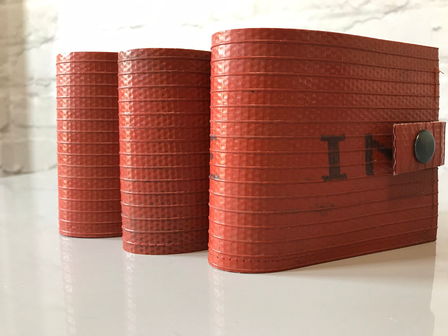 Durable red fire hose wallet for everyday carry