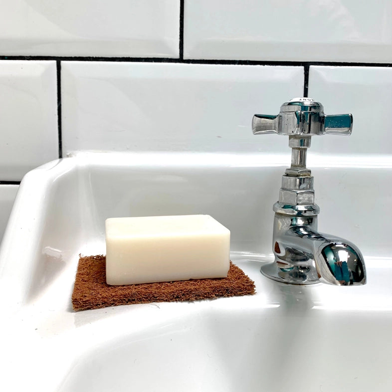 Pair of coconut coir soap rests and scouring pads made from natural coconut fibres