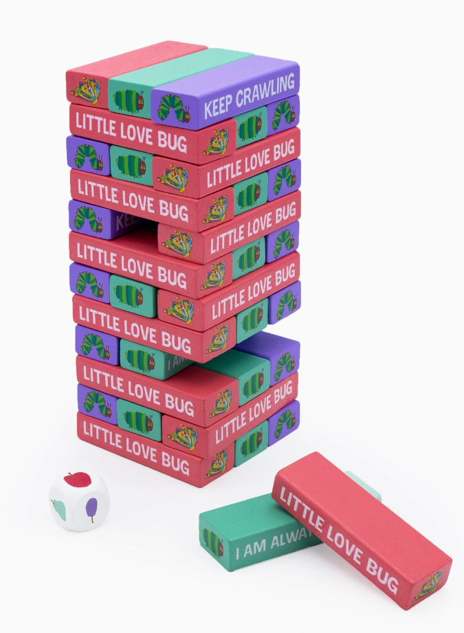 wooden tumble tower stacking game with colourful blocks and dice