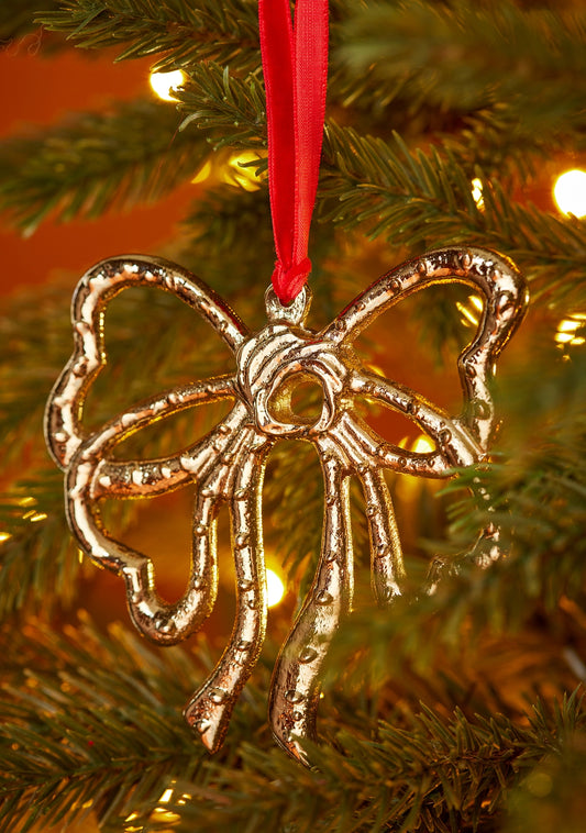 Gold bow Christmas decoration with red velvet hanging thread