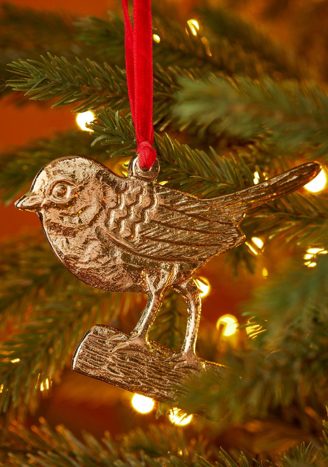 Gold metal robin on branch decoration made from recycled aluminium