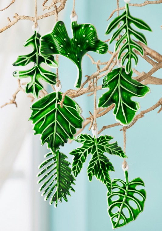 Green botanical leaf enamel hanging decoration with silver-coloured vein details and jute cord
