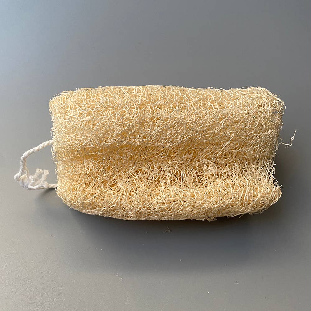Natural loofah sponge with hanging string for exfoliating and sustainable body care