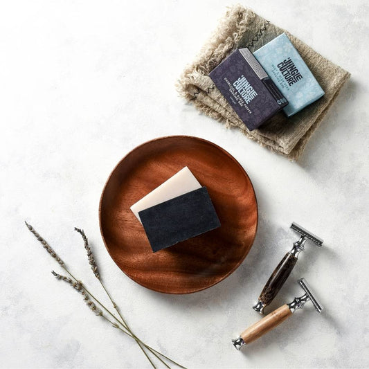 Solid shaving soap used with a shaving brush as part of a grooming routine