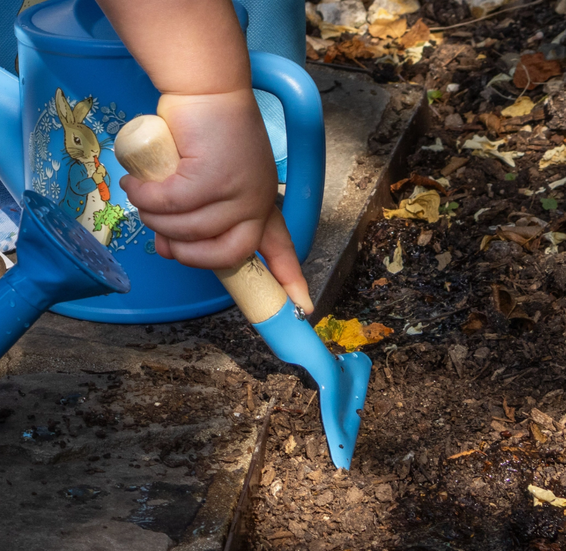 Peter Rabbit children's garden tool set with three metal gardening tools and wooden handles