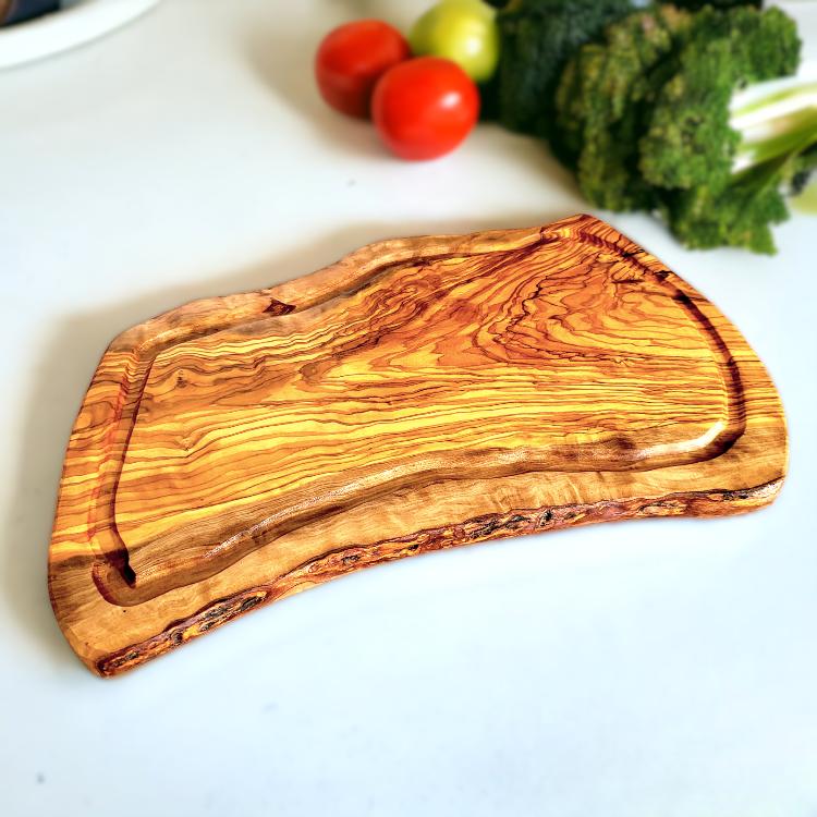  irregular shaped cutting board made of olive wood 