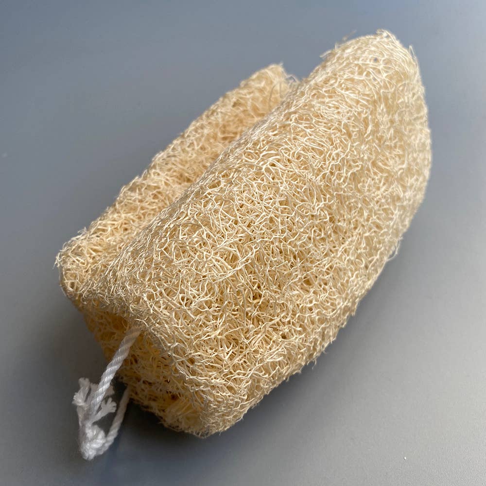 Natural loofah sponge with hanging string for exfoliating and sustainable body care