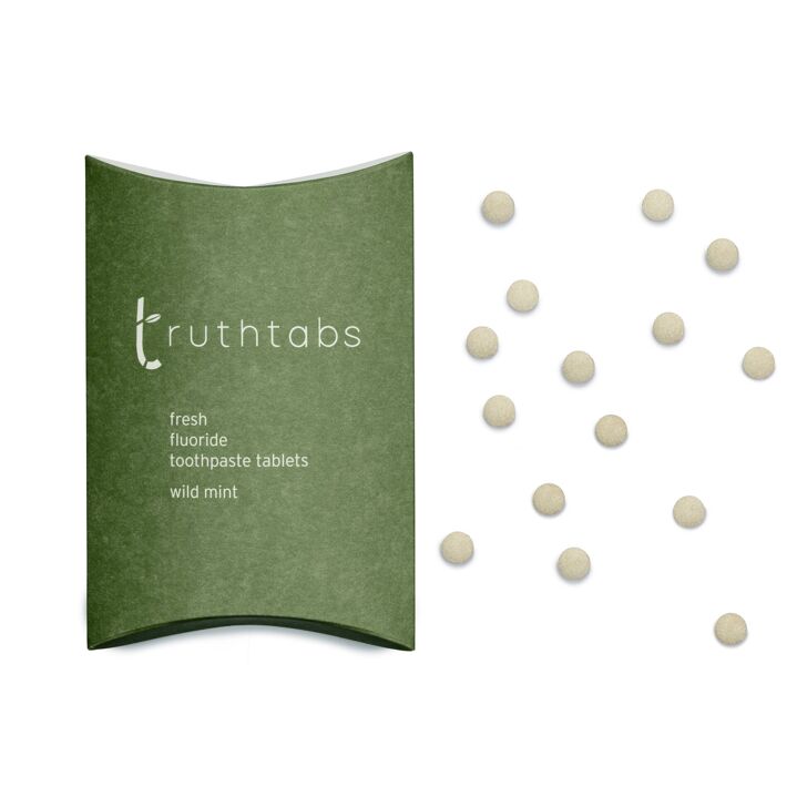 Wild Mint fluoride toothpaste tablets by Truthbrush in biodegradable plastic-free packaging.